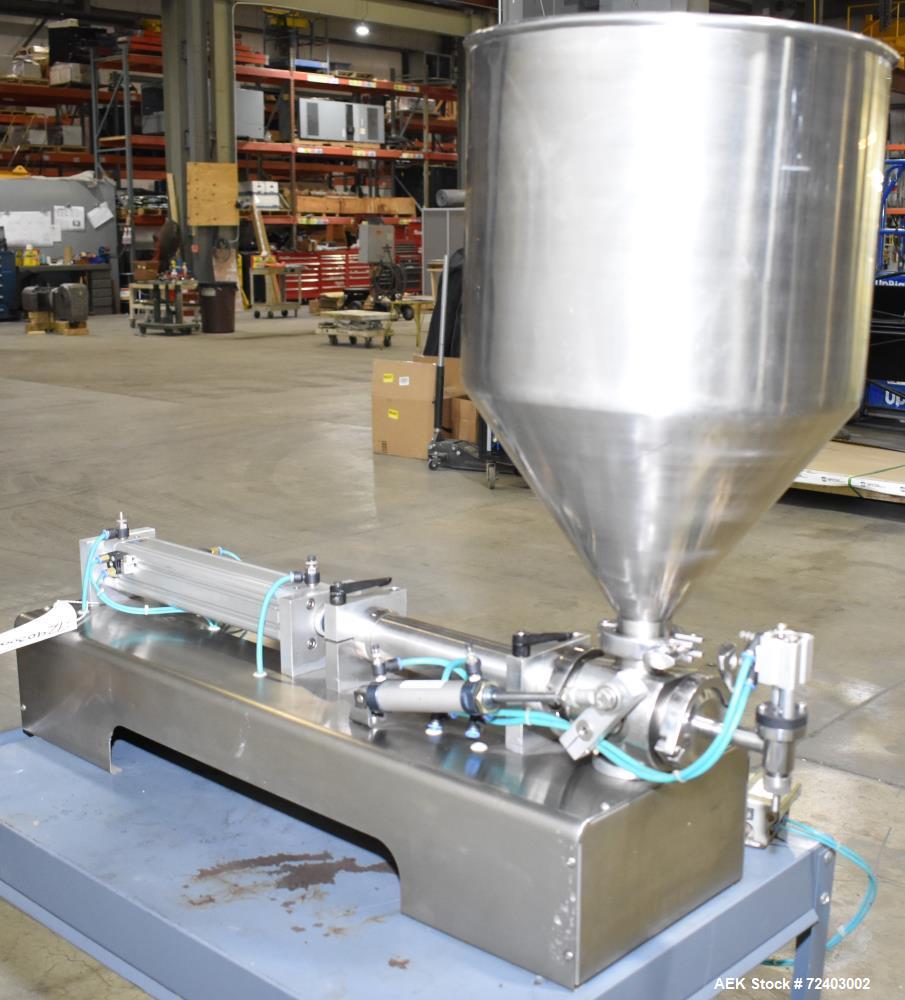 Used Wenzhou Rigao Table Top Semi Automatic Piston Filler, Model DYF. 316L Stainless steel product contact. Filling speed 5 to 20 bottles per minute. Filling accuracy /= 1% +/-. Filling range: approx...